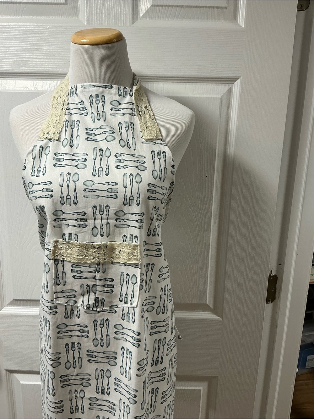 2011 - Lace-Trim White Apron with Teal Cutlery Print